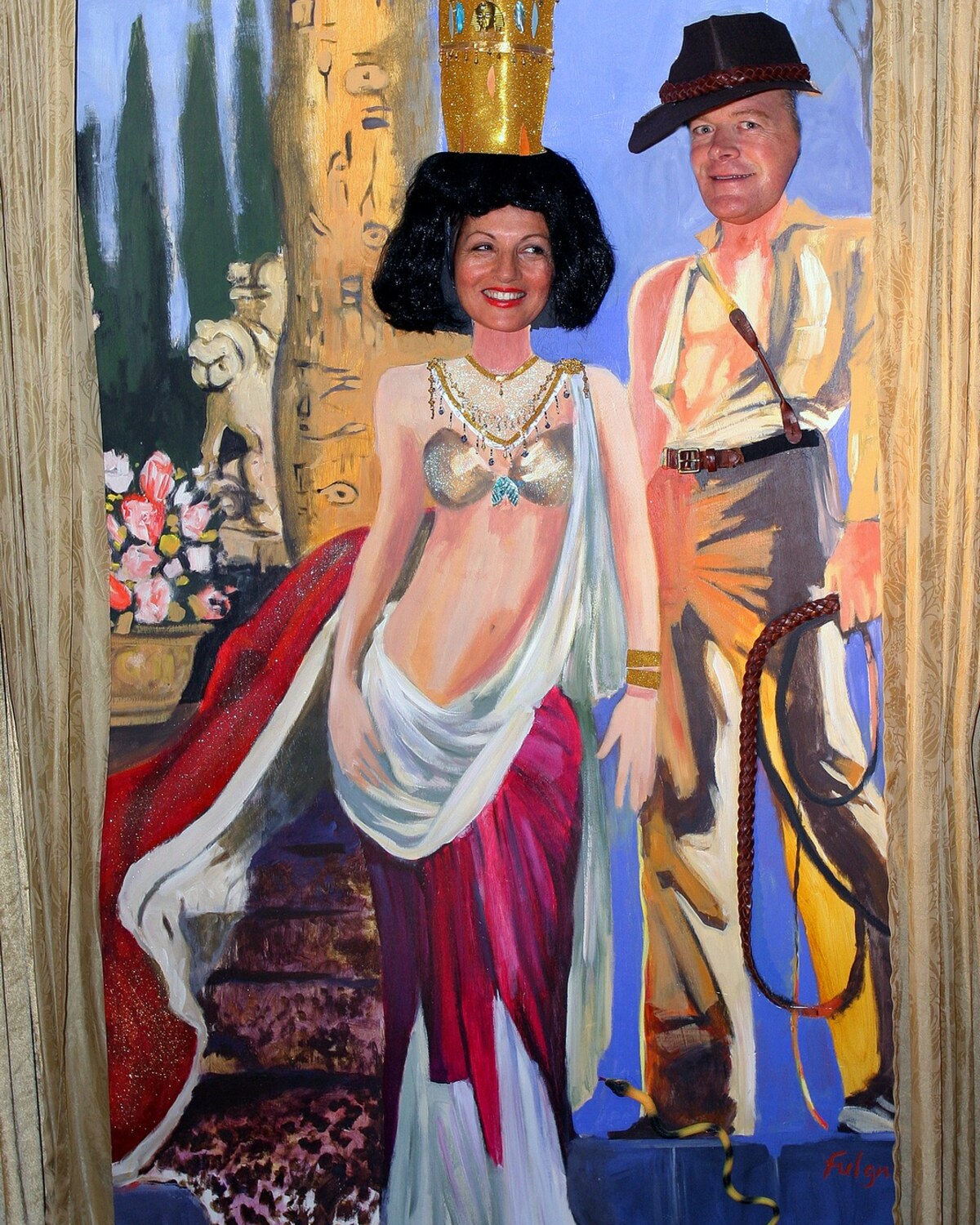 Face-in-hole photo board, Egyptian-themed couple in gold and red, by Maureen Fulgenzi