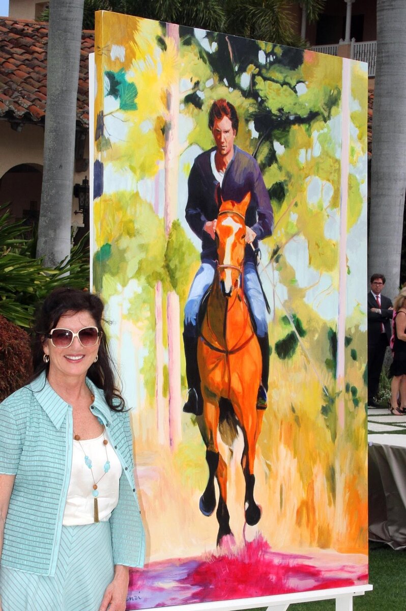 Maureen Fulgenzi at an event with an equestrian commissioned painting