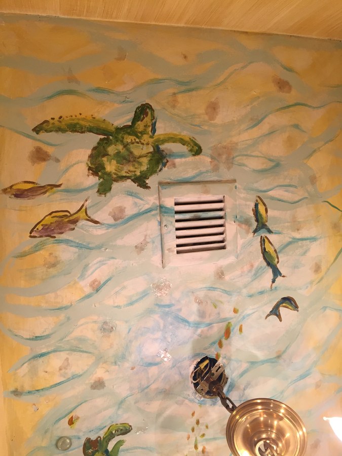 Sea turtle mural detail painted beside a floor air vent, Palm Beach, FL