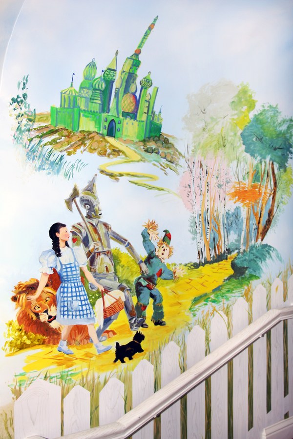 Wizard of Oz staircase mural with Emerald City, Dorothy, Tin Man, Scarecrow, Lion and Toto by Maureen Fulgenzi, Palm Beach, FL