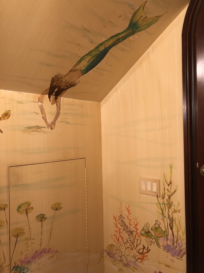 Mermaid mural wrapping the corner of a powder room, Palm Beach, FL
