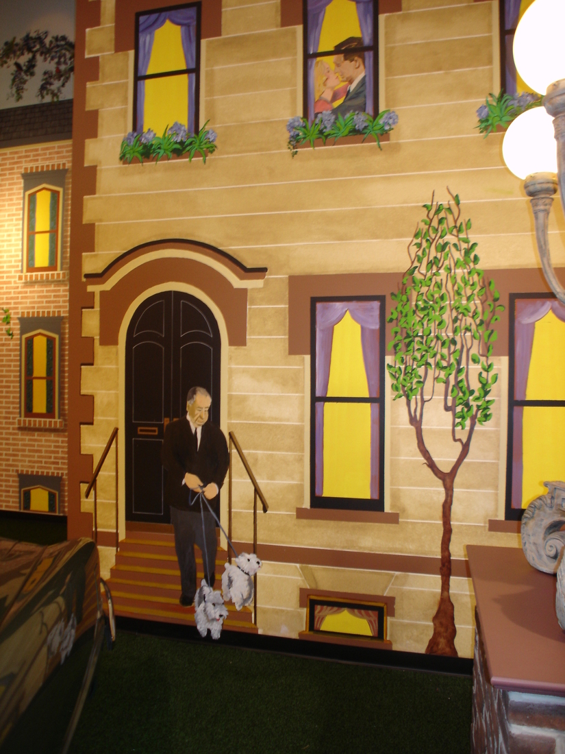 Brownstone stoop mural with a painted figure descending the stairs beside a dog, car museum backdrop, Palm Beach, FL