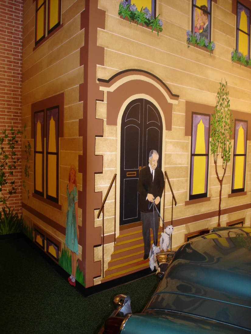 Brownstone stoop facade mural with a painted man walking a dog, car museum backdrop, Palm Beach, FL