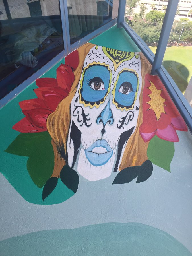 Painted sugar-skull-faced woman with a rose, final documentation view, exterior terrace mural, Palm Beach, FL