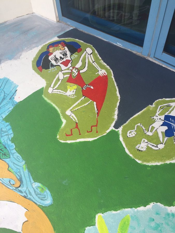 Skeleton couple dancing in a red dress, small vignette on the exterior terrace mural, Palm Beach, FL