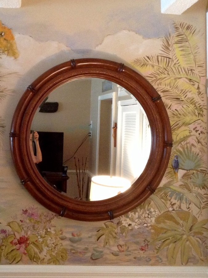Sailboats and harbor mural detail framing a round mirror, Palm Beach, FL