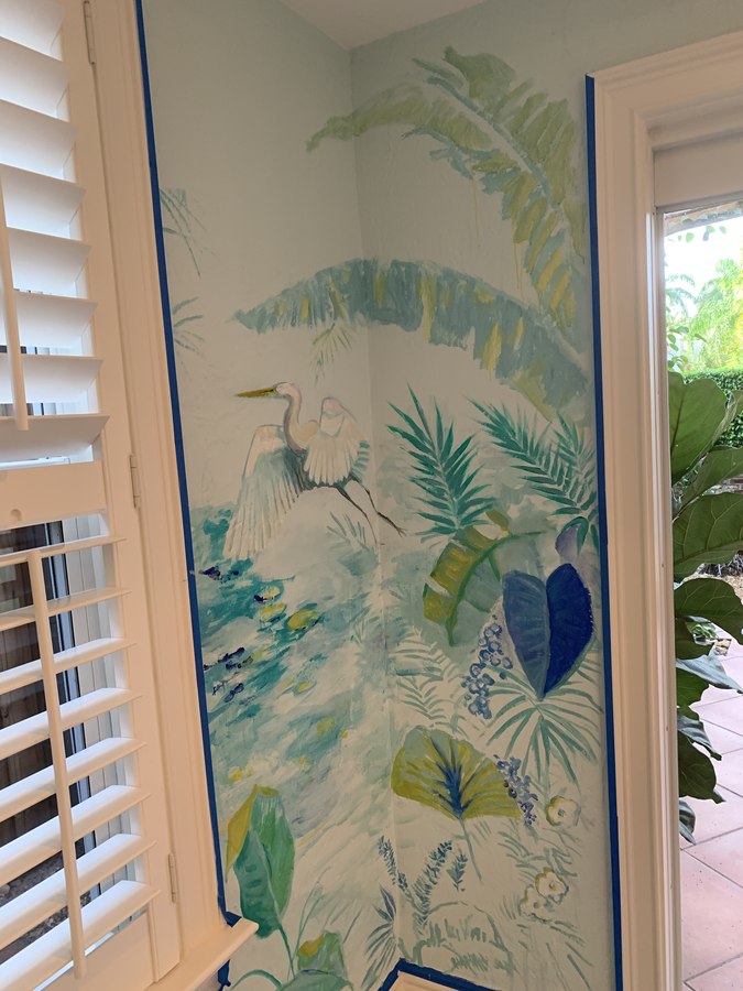 Tropical foliage mural detail near an arched doorway with heron, Palm Beach, FL