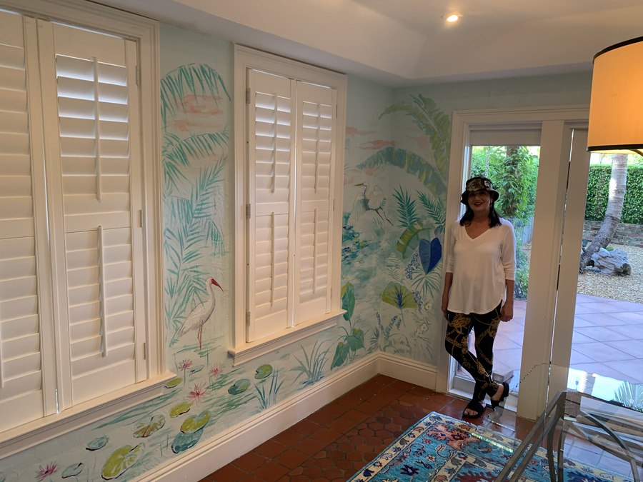 Tropical foliage mural room view with person for scale, Palm Beach, FL