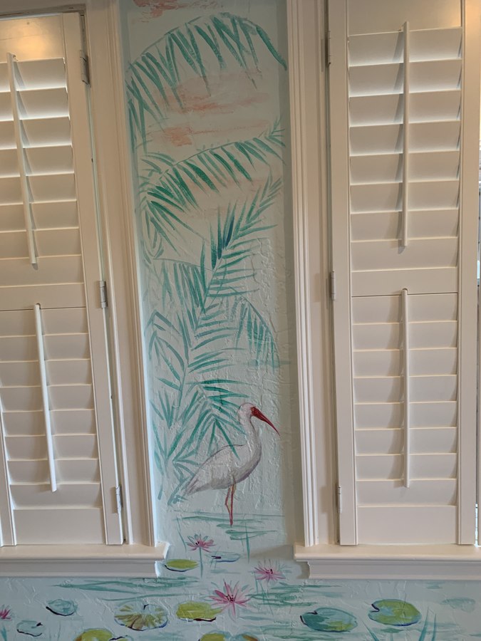 Tropical foliage mural detail beside louvered shutters, Palm Beach, FL
