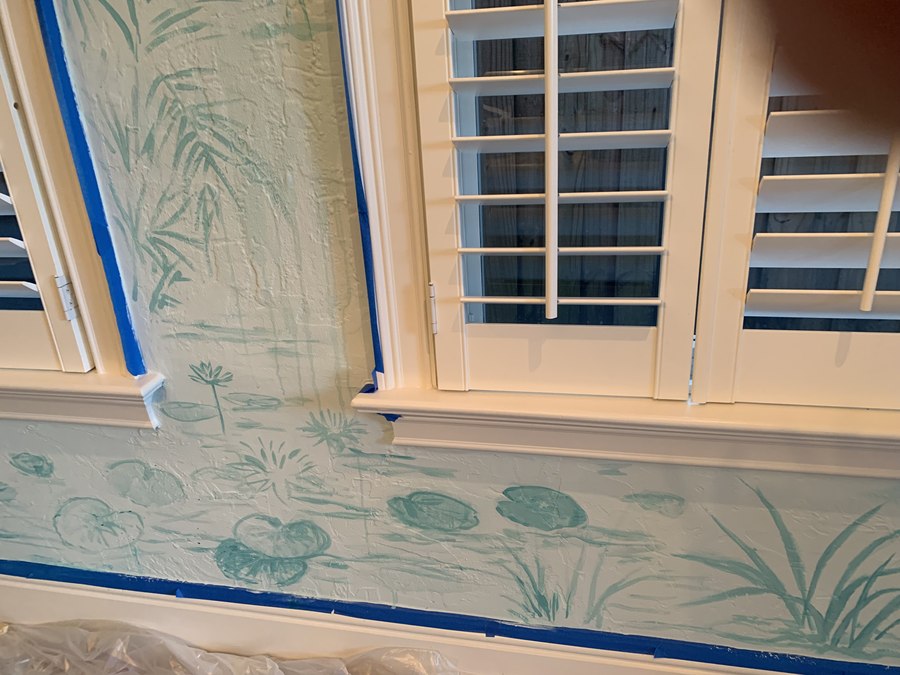 Tropical foliage and flamingo mural detail beside a shuttered window, Palm Beach, FL