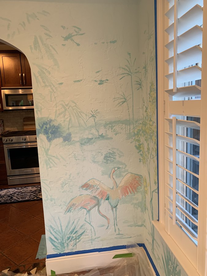 Tropical foliage mural detail with kitchen archway visible, Palm Beach, FL