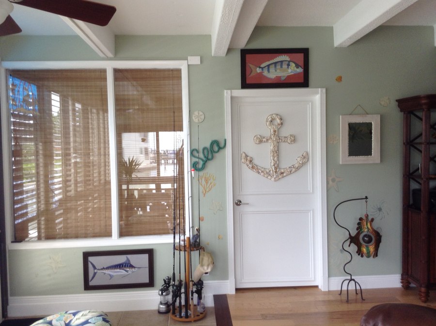 Realistic sealife and nautical mural room view with anchor door and fish art by Maureen Fulgenzi — Soft palette, Palm Beach, FL