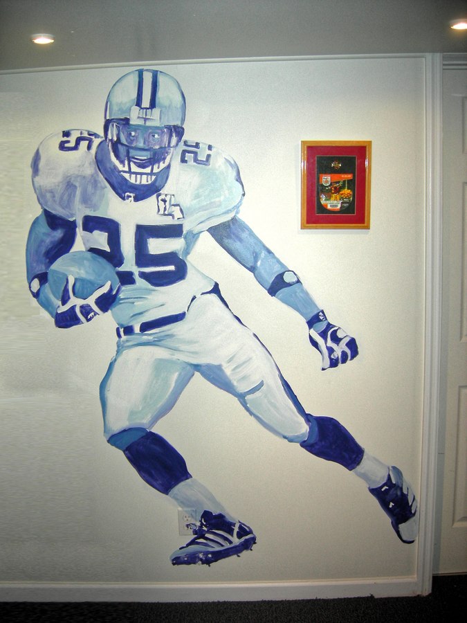 Football player game room mural detail in team uniform, Palm Beach, FL