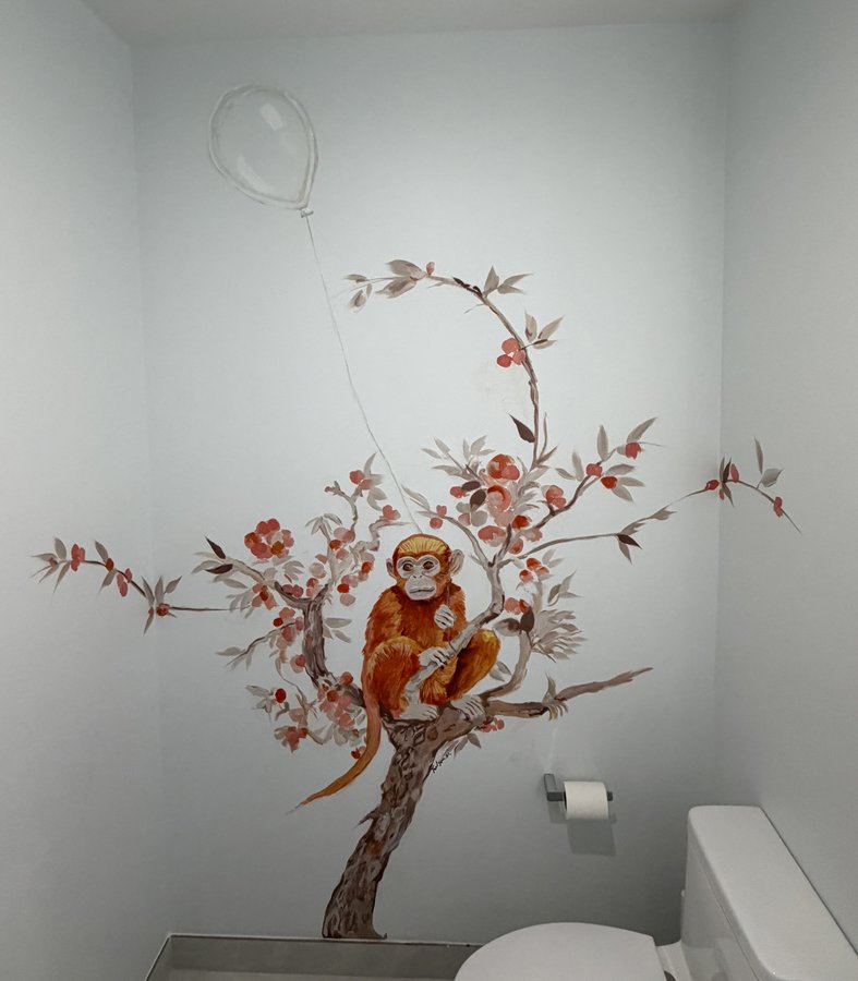 Chinoiserie monkey in a cherry blossom tree with a balloon mural in a powder room by Maureen Fulgenzi, Palm Beach, FL