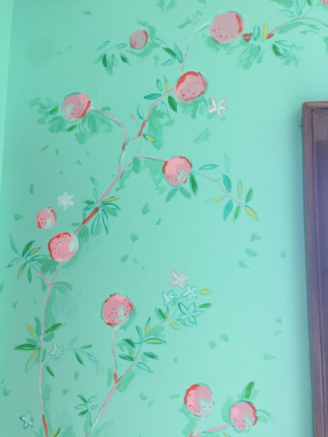 Rose branch mural detail with pink blooms and green leaves, Palm Beach, FL