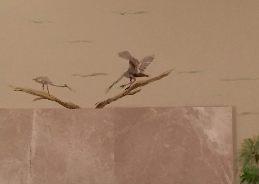 Pair of wading birds mural detail above the harbor scene, Palm Beach, FL