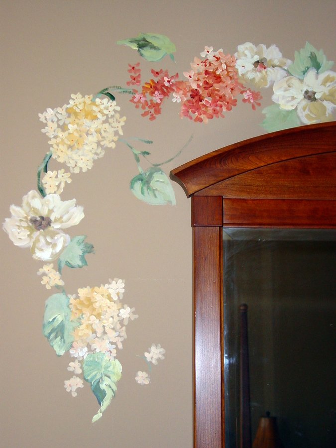 Floral branch mural arching over a wood armoire, cream and coral blossoms, Palm Beach, FL