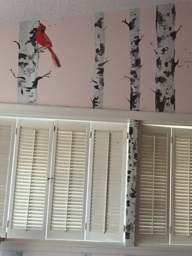 Birch tree mural detail with a cardinal perched on a branch, above the shutters, Palm Beach, FL