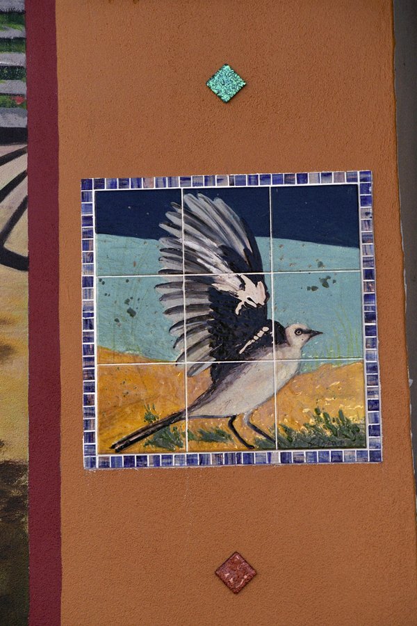 Tile mosaic detail on the Stuart mural border, butterfly and florals, Palm Beach, FL