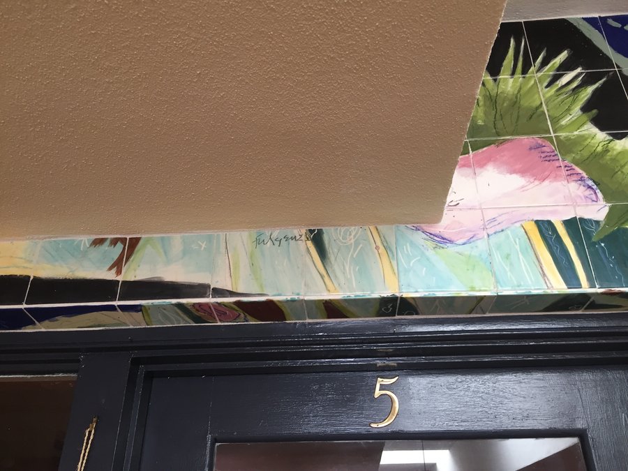 Close-up of the painted tile florals above the Agape Healing Arts entrance, Palm Beach, FL