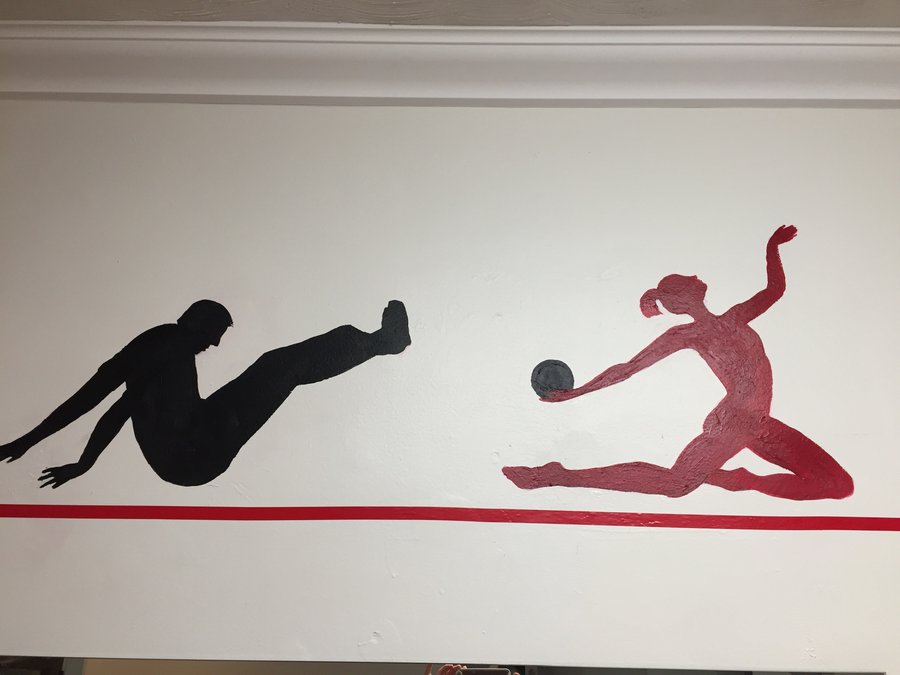 Reformer and stretching silhouette figures painted along the gym mural border, Palm Beach, FL