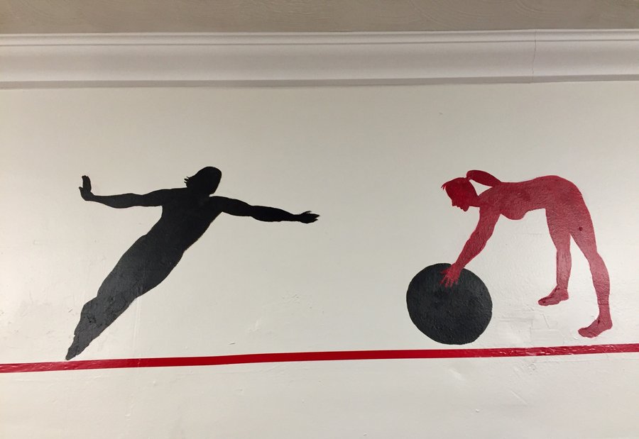 Second view of the plank and stability-ball figures in the gym mural border, Palm Beach, FL