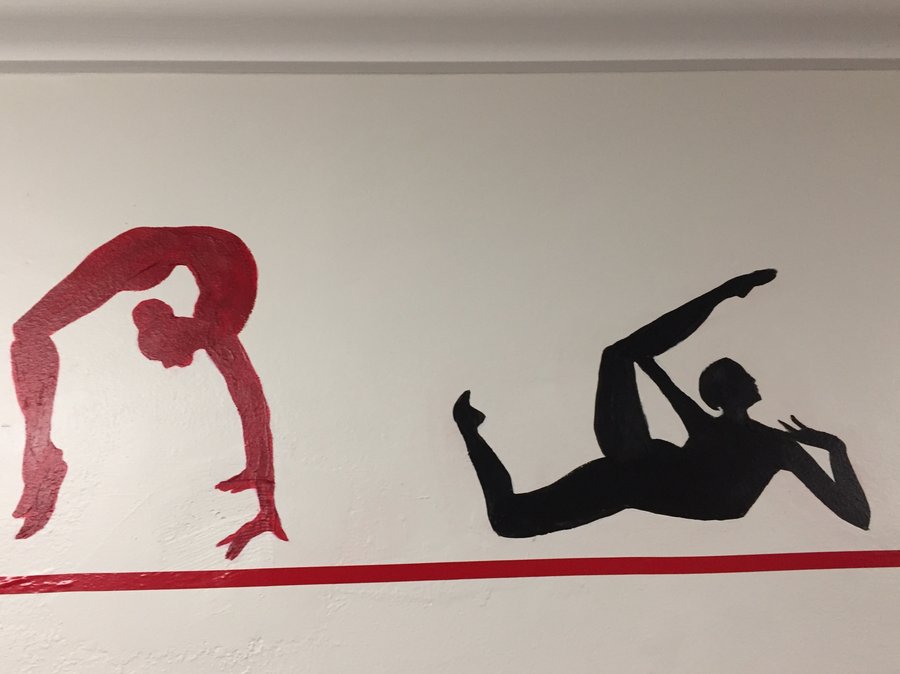 Second view of the kettlebell-swing figures in the gym mural border, Palm Beach, FL