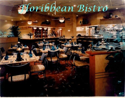 Restaurant dining room interior showing the space's current signage, Palm Beach, FL