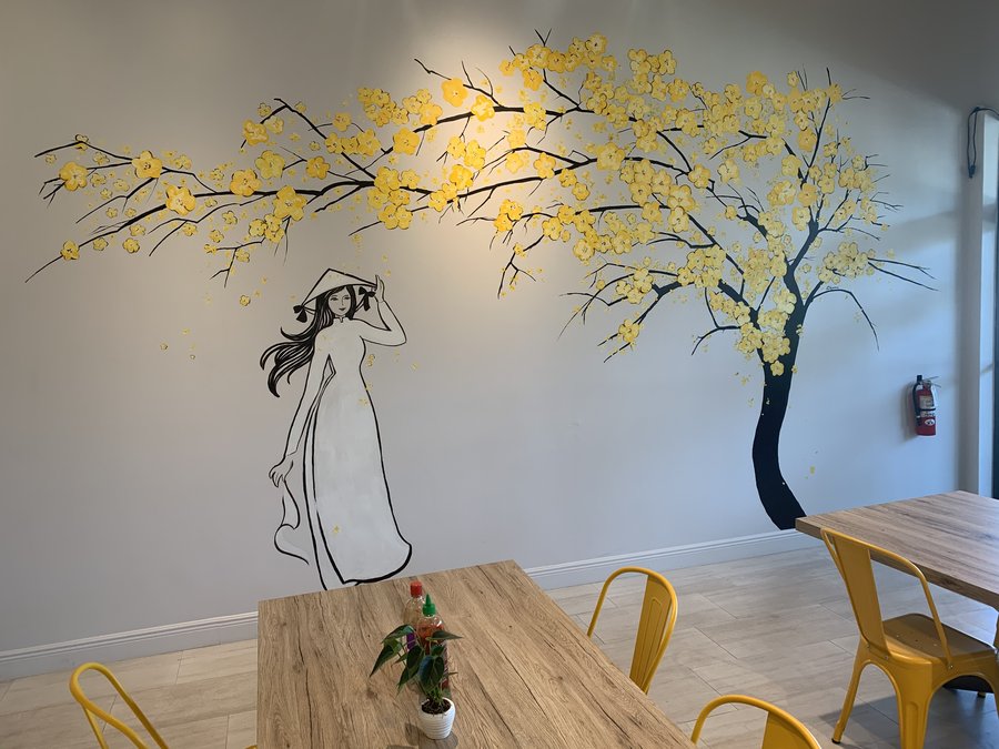 Social media post announcing the finished mural, Pho and Rolls, Palm Beach, FL