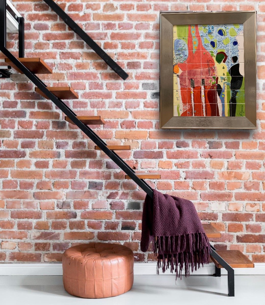 Colorful abstract figures painting by Maureen Fulgenzi on an exposed brick stairwell wall, Palm Beach, FL
