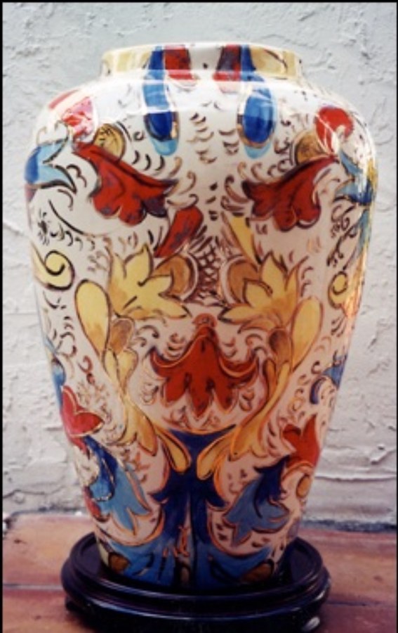 Folk Ornate red, blue & yellow florals hand-painted vase by Maureen Fulgenzi — Vivid & bold (red, blue, yellow) palette, Palm Beach, FL